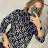 Светр шаховим візерунком літери з коміром стійкою та 3/4 рукавом N.Every Day синій
