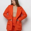 Брючний костюм Dolce помаранчевий